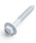 Close-up of white hex head concrete screw anchor part of 100 pack 1/4-Inch by 2-3/4-Inch for masonry concrete brick block use.