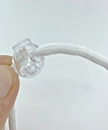 Close-up of transparent orb with rope from Roman Shade Orbs Lock Rope Buckle Kit For Easy Leveling Of Window Treatments Orb Leveling Device