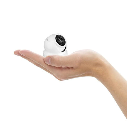 Compact Mini Turret Dome Camera 1080p Security 4 In 1 Hybrid AHD TVI CVI Analog Weatherproof MicroDome held in a hand