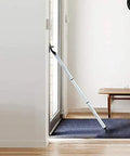 Two In One Door Security Bar And Sliding Patio Door Stopper Jammer installed in a doorway, adjustable heavy duty iron with white finish