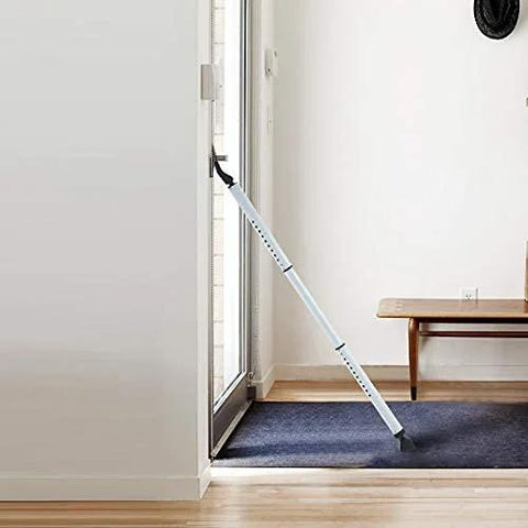 Two In One Door Security Bar And Sliding Patio Door Stopper Jammer installed in a doorway, adjustable heavy duty iron with white finish