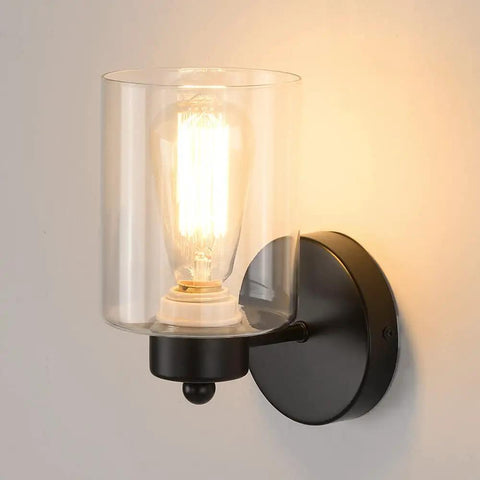 One Light Matte Black Bathroom Vanity Sconce With Clear Glass Shade Vintage Style Wall Light Fixture on white wall