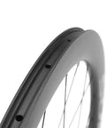 Close-up of 50mm Carbon Fiber Road Bike Wheelset Disc Brakes 700c Tubeless Ready 25mm Wide showing rim holes