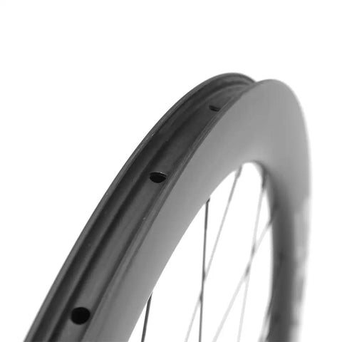 Close-up of 50mm Carbon Fiber Road Bike Wheelset Disc Brakes 700c Tubeless Ready 25mm Wide showing rim holes