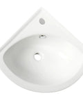 Top view of White 22 Inch Corner Wall Mounted Ceramic Porcelain Sink With Faucet Hole Durable Glossy Glaze For Small Bathrooms And Modern Quarters Ideal For Tight Spaces And Contemporary Baths.
