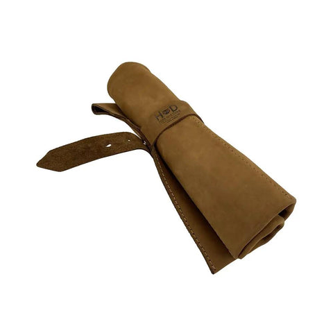 Six Slot Leather Tool Roll Up Bag For DIYers in Bourbon Brown, rolled view showcasing full grain leather and strap