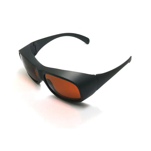 Professional Grade Infrared Laser Safety Glasses Shielding Your Peepers From 532Nm 808Nm And 1064Nm Beams With Built Tough Clear Lens And Killer Optical Density - side view with orange-tinted lenses.