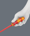 Person holding Kraftform Kompakt VDE Insulated Blade Set With Interchangeable 60i blade, ergonomic handle visible.
