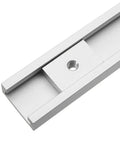 Close-up of a Heavy Duty M8 T Slot Nut Set For Woodworking showing an aluminum alloy T-track slider in a milling table slot.