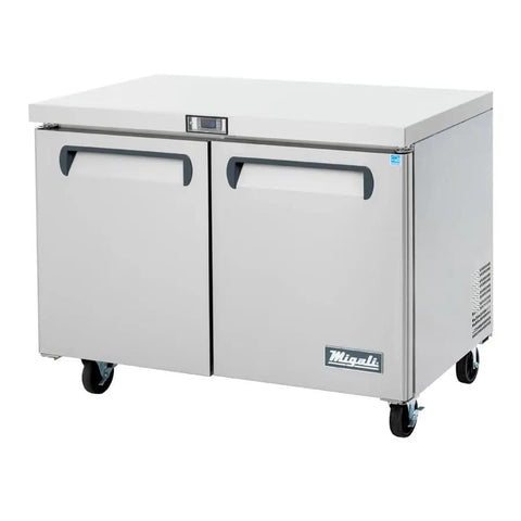 Top Shelf Polished Stainless Steel 48 Inch Undercounter Work Top Freezer Featuring Rock Solid Forced Air Cooling Digital Temp Display Slick Design Ready To Roll, showing stainless steel finish and mounted casters.