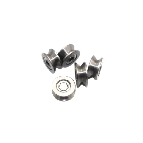 Five precision mini bearings from the Ten Pack Of Super Smooth Deep Groove Mini Bearings For Wire Guide Tracks And Over Line Pulleys.