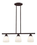 Transitional three light linear chandelier from Somerville Collection in bronze finish with hand blown satin opal glass bulbs not included