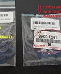 Close-up of Toyota Oil Drain Plug Gasket Set Blue QTY 10 For Quick No Fuss Oil Change Replacement Seals in packaging with warranty label.