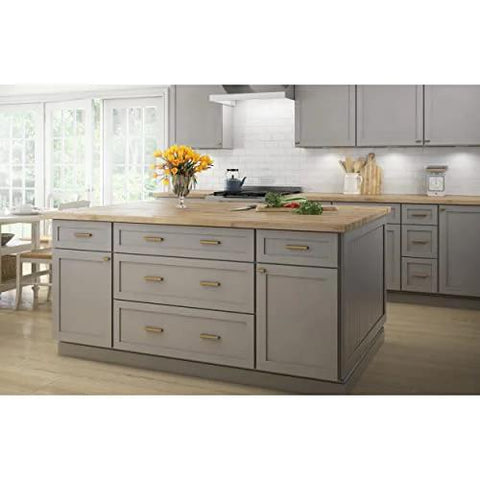 Kitchen island with Champagne Bronze Cabinet Handles 5 Pack Adjustable Drawer Pulls for Cabinets, coordinating with decor.
