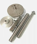 High‑pressure waterjet tube bending tool kit components: stainless steel rods, round dial plate with angle marks, and a clamp block.