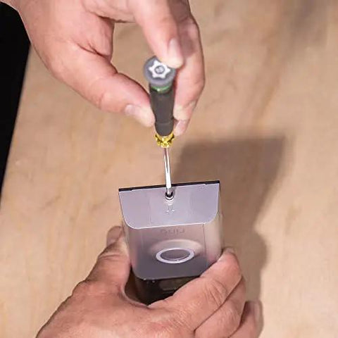 Using a Tiny 8 Piece Mini Precision Screwdriver Set For Electronics And Terminal Blocks With Cushion Grip Handles to fix electronics.