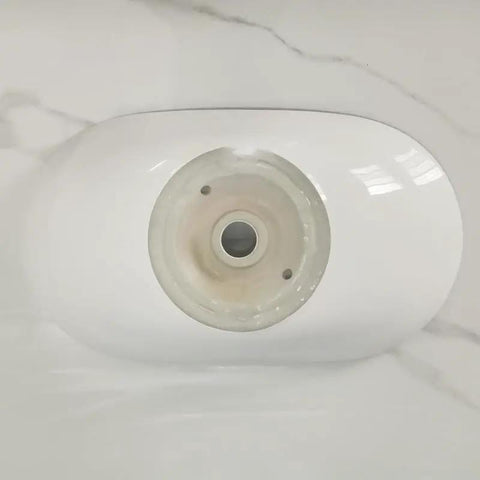 Top down view of Bathroom Sink Modern Minimalist Art Basin Hotel Bathroom Ceramic Above Counter Basin with center drain.
