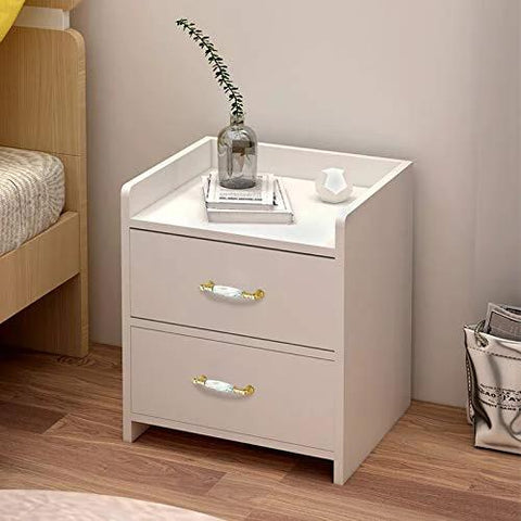 White nightstand with Crystal Drawer Pulls 2 Pack Glass And Zinc Alloy Cabinet Handles With Gold Finish installed, in bedroom setting.