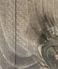 Close-up of wood showing authentic driftwood gray finish from Slick Water Based Aging Wood Stain for raw interior boards.