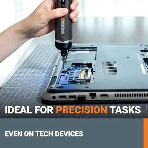 4V Lithium Cordless Screwdriver Kit With 30 Piece Accessory Pack used on tech device for precision work, black and silver design