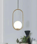BEQAOR Modern Globe Pendant Light, 1-Light Oval Hoop Hanging Ceiling Fixture with Frosted White Glass Shade and Gold Finish Frame for Bedroom Bedside, showcasing an elegant oval design with a soft-glow globe.