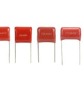 Four red radial lead capacitors from Must-Have 180Pcs Metallized Film Capacitor Kit For DIY Electronics, PCB And Arduino Projects.
