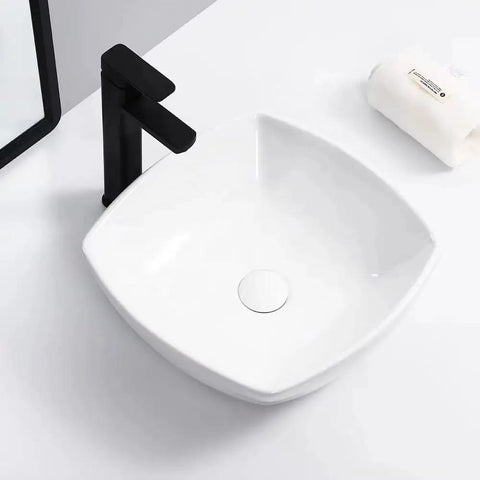 Bathroom Sink Bathroom Vessel Sink Household Ceramic Wash Basin Hotel Countertop Basin Ceramic Vessel Sink Square Art Basin Bathroom Sink Vessel with black faucet top view.
