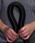 Person holding 50 Foot Ultra Flexible Crushproof Commercial Vacuum Hose 1.5 Inch Inner Diameter For Backpack And Canister Vacs