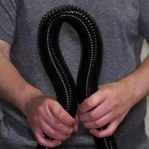 Person holding 50 Foot Ultra Flexible Crushproof Commercial Vacuum Hose 1.5 Inch Inner Diameter For Backpack And Canister Vacs