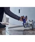 IRWIN Quick-Lift construction jack, blue-handled hand lifting tool with long steel bar on wooden floor
