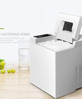 Premium Stainless Steel Freestanding Ice Maker Cranks Out Thirty Three Pounds Bullet Ice Daily With Slick Touch Panel No Sweat Rapid Chilling For Kitchens Bars And Office Spots on countertop with ice.