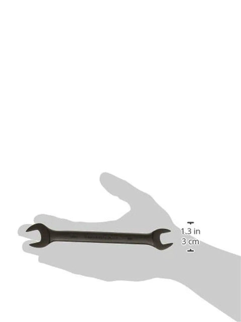 Open End Wrench One Half Inch By Nine Sixteen Inch, Slim Profile, heavy duty alloy steel, black finish, held in hand for scale.