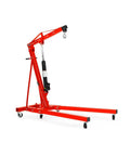Rock Solid Two Ton Folding Engine Crane For Heavy Duty Garage Days with red steel frame and swivel wheels for easy mobility.