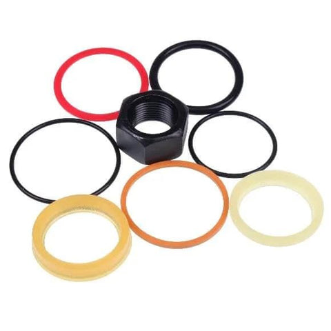 Heavy Duty Cylinder Seal Kit 7135558 6803325 Compatible With Bobcat Loaders 753 763 773 7753 And Excavators 220 320 322 323 Rod One And A Half Inch Bore Two And A Quarter Inch Seals For Reliable Hydraulic Performance. Seals and nut displayed.