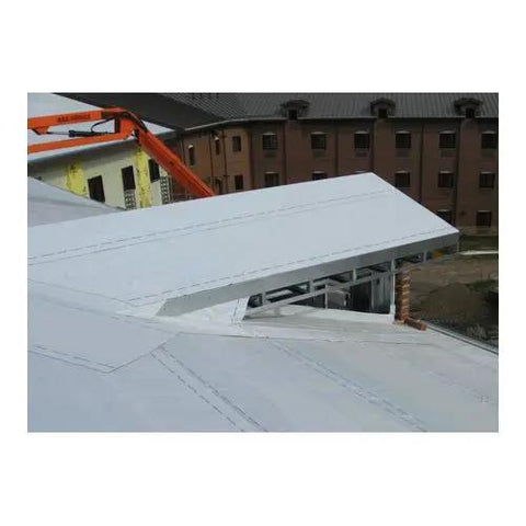 Heavy Duty Rubberized Asphalt Wind And Water Seal Underlayment Single Roll with Savage Grip Adhesion installed on a roof edge.