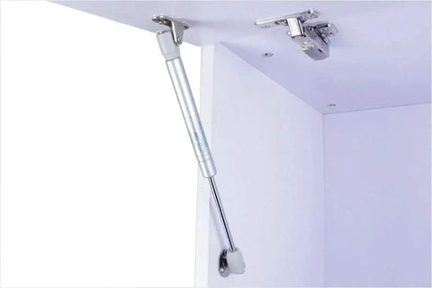 Top Shelf Heavy Duty Gas Struts 2 Pack For Cabinet Doors And Toy Box Lids 150N 33lbs force soft close strut installed in cabinet.