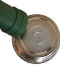 aPraktika vacuum valve with green nozzle installed on a shiny metal jar lid