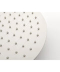 Close-up of 10" Rain Head from Shower System with silicone nozzles, brushed nickel finish for wall-mounted installation.