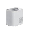 Fast Countertop Ice Maker Portable With Self Cleaning Setup Produces Crisp Cubes In Minutes And Delivers Twenty Six Point Five Pounds Daily side view of white ice machine.