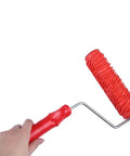 Game Changing Wall Embossing Roller For DIY Pros Create Dope Textured Finishes On Interior Paint Jobs This Bad Ass Tool with red textured surface.
