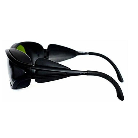 Kickass Wide Spectrum Laser Safety Glasses Offering Hella Tough OD5 Protection And Industrial Pc Lens Build showing side view with green tinted lenses.