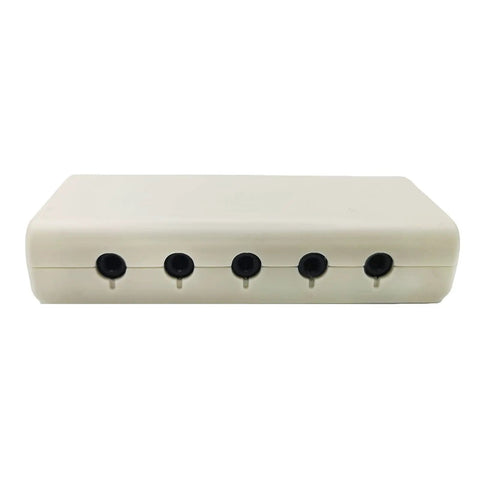 MickXer 5 Way Passive Mixer with five stereo inputs visible, beige rectangular body, connectors shown, top view.