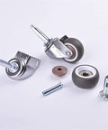 Rubber Caster Wheel Set Of 4 For Furniture And Trolleys, 1.5 Inch Wheels With 5/16 X 1.5 Inch Stems shown disassembled