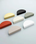 Dark Grey Two And A Half Inch Drawer Pulls Set Of Eight Handles Four Pairs Semicircle Half Moon Cabinet Pulls displayed in multiple colors