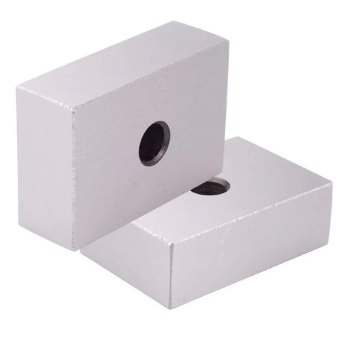 Angled view of two silver hardened steel 1x2x3 in machinist blocks with through holes, matched pair.