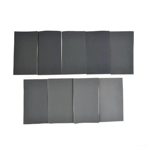 Dope Wet And Dry Sandpaper Kit Silicon Carbide 15 Pack 400 To 3000 Grit sheets laid out for multi-surface use