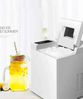 Reliable High Output Countertop Ice Maker Creates Fresh Nugget Ice Automatically With Self Cleaning Mode And Dual Cube Sizes For Effortless Cold Sips And No Sweat Family Gatherings, showing ice being made.