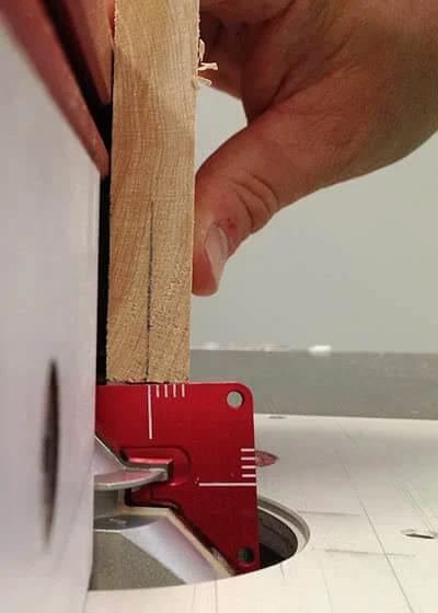 Lock Miter Master Jig For Three Eighths Inch To Three Quarters Inch Stock, CNC machined steel body in use with wood on router table
