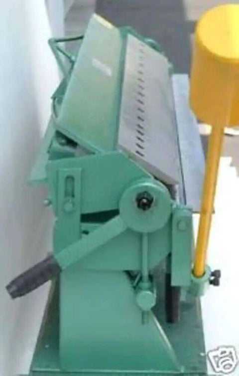 Side view of a Beefy 48 Inch Sheet Metal Pan And Box Brake for 16 Gauge Steel and 11 Gauge Aluminum with hardened steel box fingers.