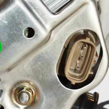 Close-up of connection port on Alternator For 2000-2004 Toyota Tacoma, One Hundred Percent New OE-Comparable Drop-In Replacement